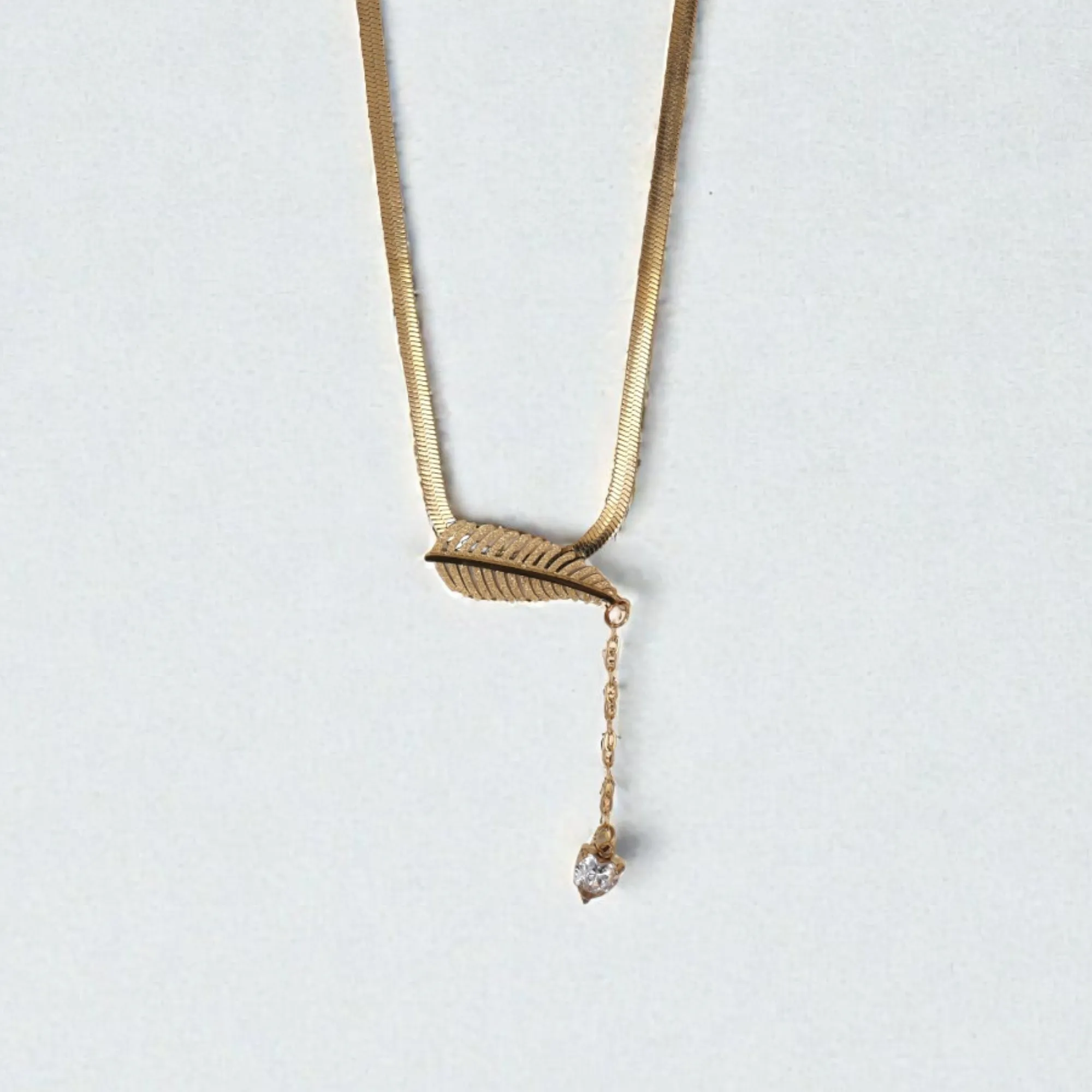 60 Rineva Golden Leaf Drop Necklace - Image 1