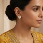 Rineva Golden Heart Glow Crystal Stud Earrings - Image 2