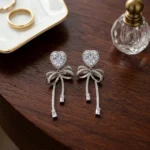 Rineva Crystal Heart Bow Drop Earrings - Image 3